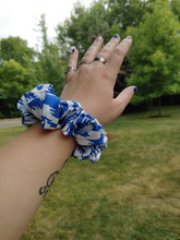 Load image into Gallery viewer, blue and white abstract print scrunchie on a wrist