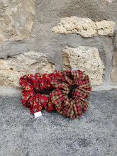 Load image into Gallery viewer, red scrunchies with sun flowers and plaid squares beside brown and red plaid scrunchie