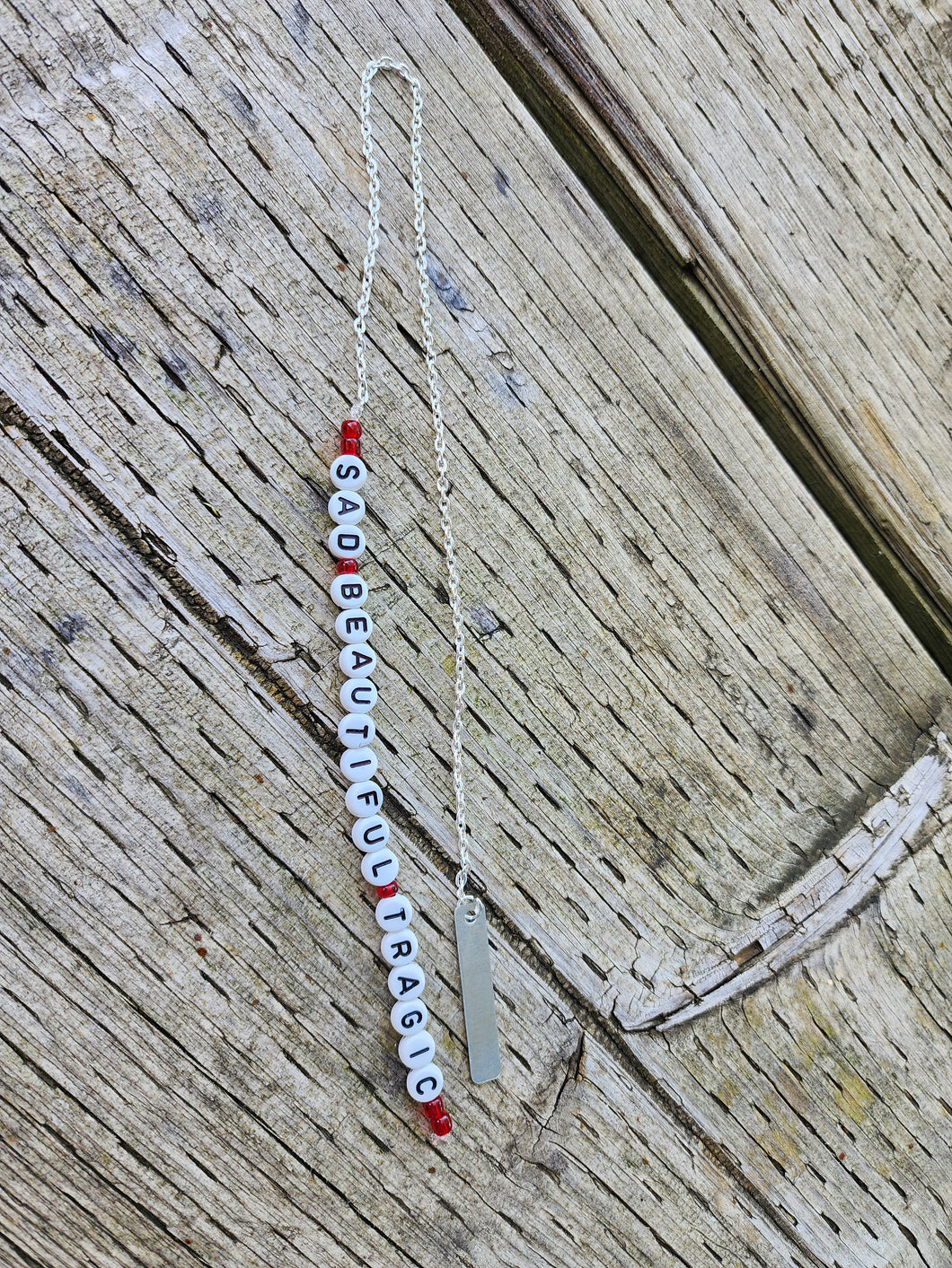 Sad beautiful tragic friendship bracelet bookmark